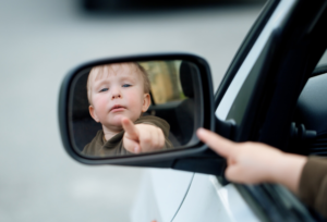 Self-Connection Psychotherapy obstacles- Small child looking to outside mirror